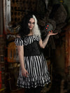 Cute model wearing a black and white wig beetlejuice costume with black mesh waist training corset 