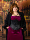 cute corset model wearing the cs345 black satin waist training corset with a dark fuchsia velvet dress