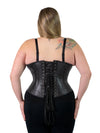 back lace up corset view of a plus size black leather corset worn by a model wearing a CS345 romantic curve waist training corset with a black bra and black leggings