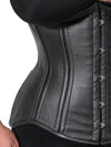 close up detail view of plus size black leather corset worn by a model wearing a CS345 romantic curve waist training corset with a black bra and black leggings