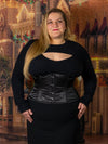 Plus sized corset model wearing the cs411 standard satin corset with a black sweater dress and boots