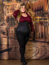 plus size model wearing a 426 black cotton longline waist training corset in a festive scene