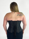 back lace up corset view of a plus size corset in pinstripe fabric