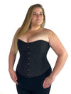 Plus size corset worn by model with black leggings Authentic steel boned corset in pinstripe fabric